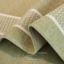 Woven border and chenille texture close-up