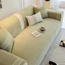Green chenille seat cover in natural light