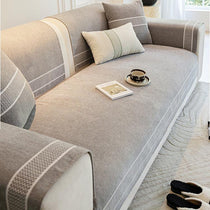 Gray modular sofa cover with contrast trim