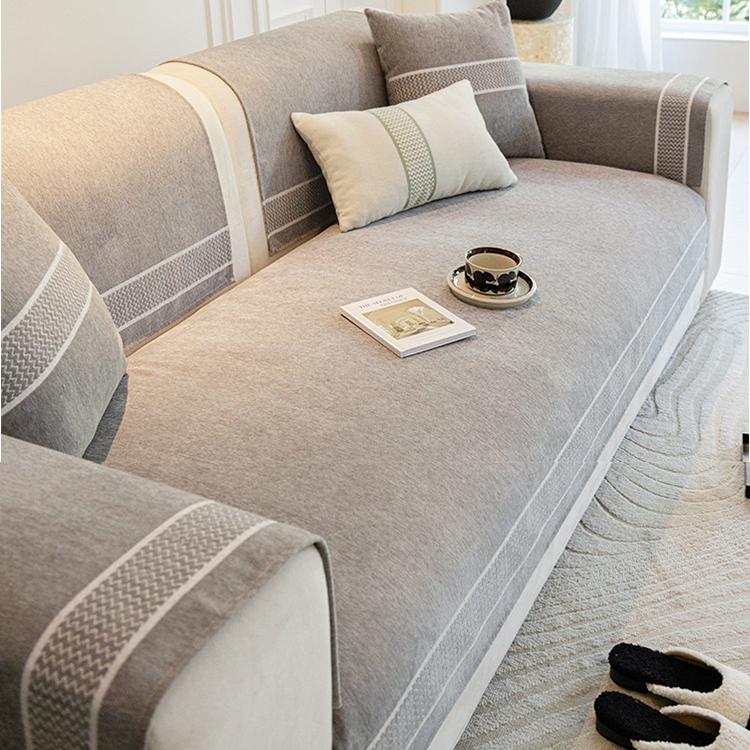 Gray modular sofa cover with contrast trim