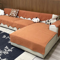 Orange sectional couch cover with chaise coverage