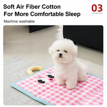 Durable plaid dog mat surface being wiped clean of loose fur