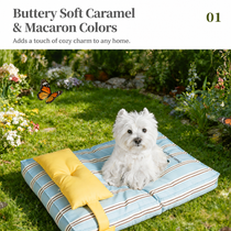 Small dog sitting on a blue striped cushioned bed